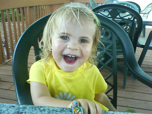 Rowan happy and healthy in her favorite yellow shirt.