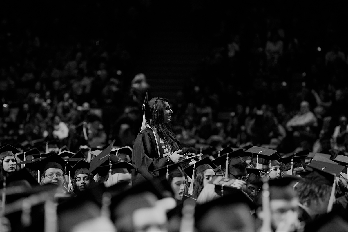 students wearing graduation regalia